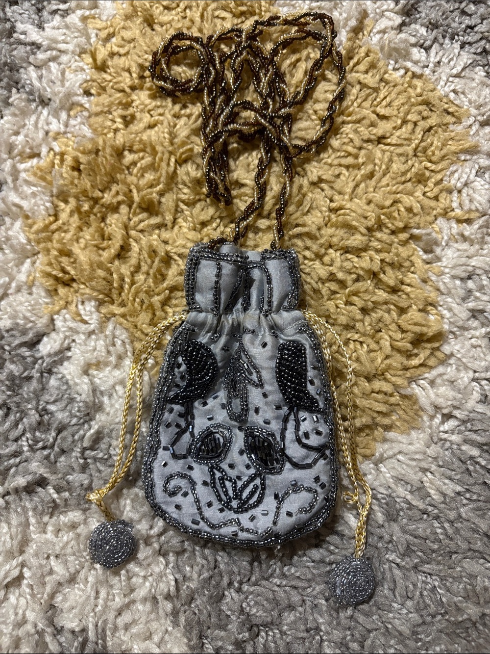 Gray Beaded Drawstring Mini Bag with Gold Accents
